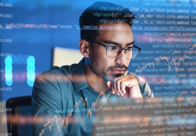 man at computer screen